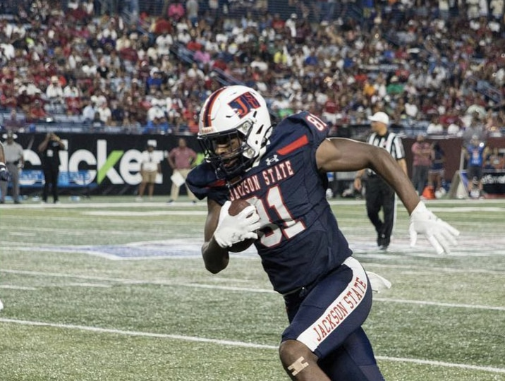 Jackson State football player carries the ball during the 2023 MEAC/SWAC Challenge against South Carolina State